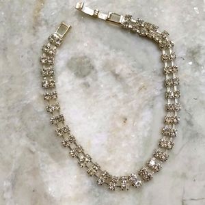 Beautiful tennis bracelet. Faux diamonds. 8 " long.